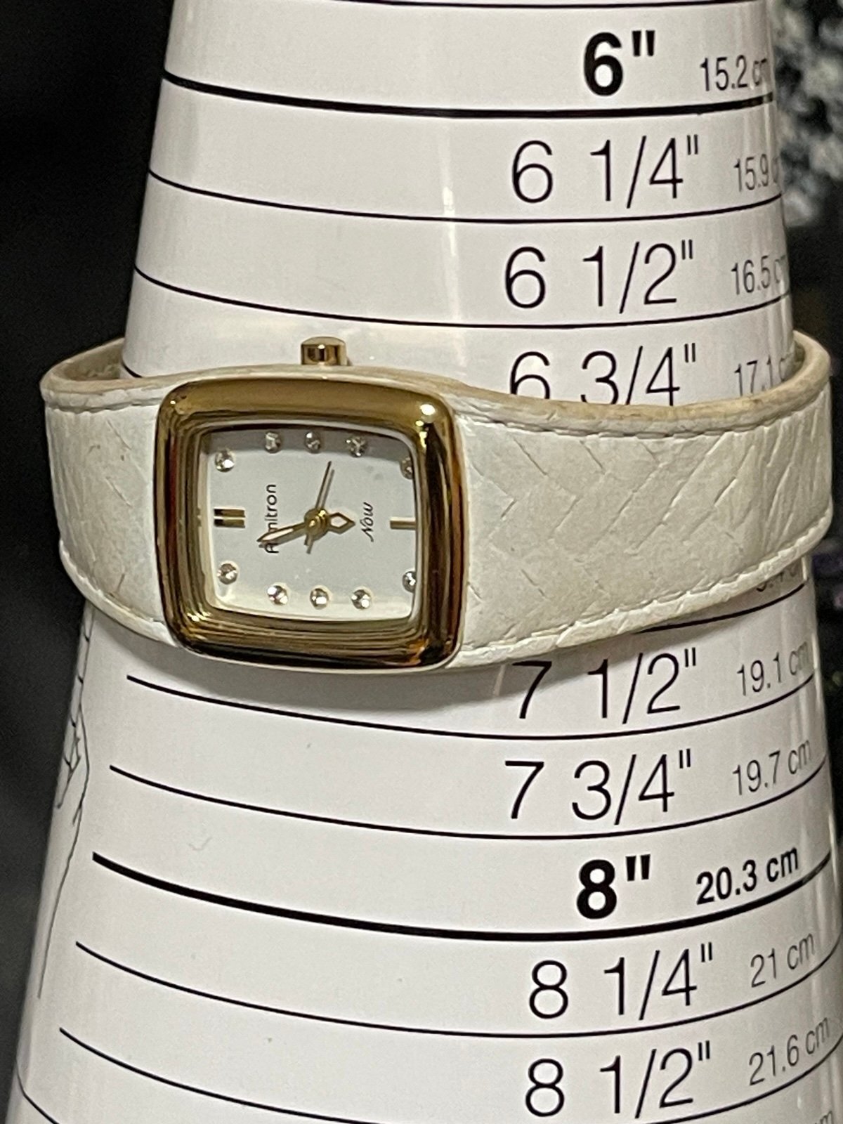 Armitron Now Ladies Goldtone Bezel Rhinestone Accent Dial White Leather Band
