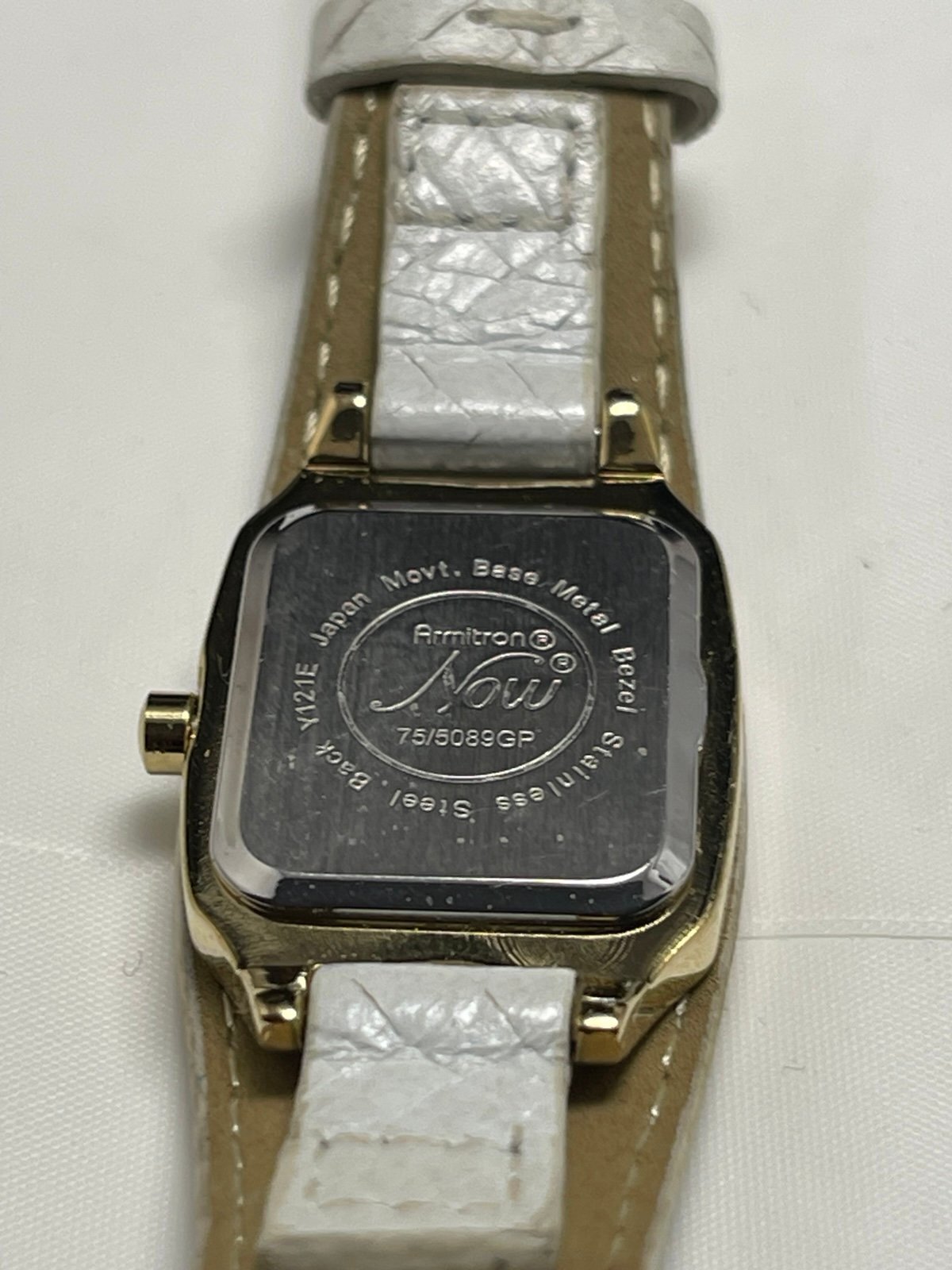 Armitron Now Ladies Goldtone Bezel Rhinestone Accent Dial White Leather Band