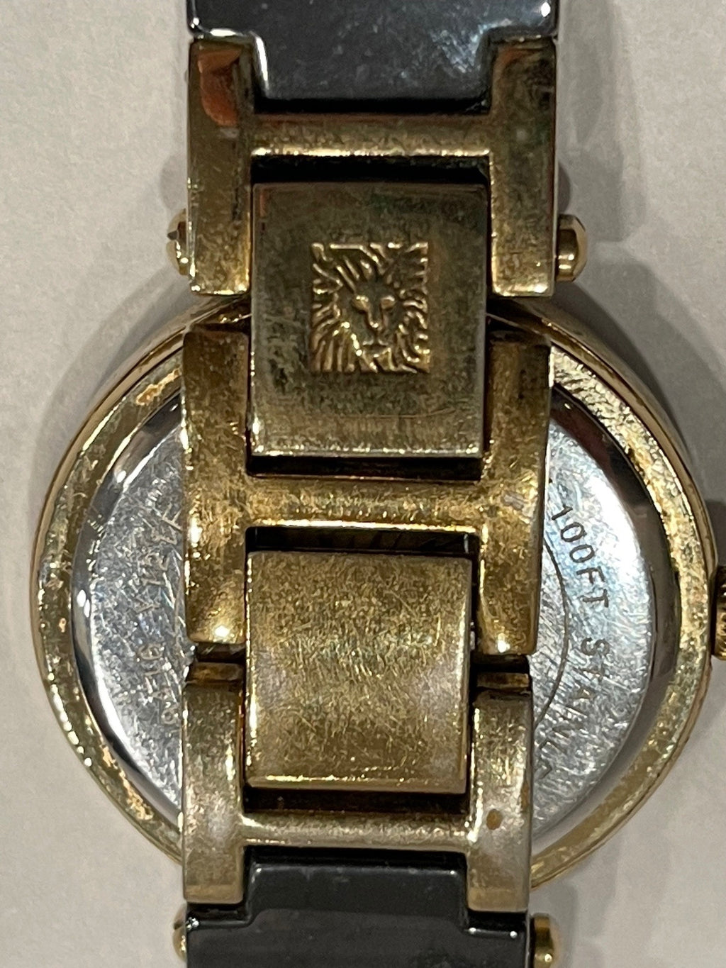 Anne Klein Women's Wristwatch Black and Gold Tone with Rhine